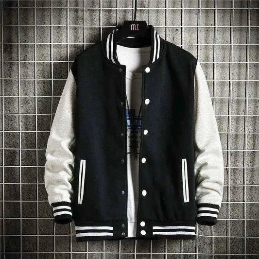 Man in black and white baseball jacket - Premium Baseball Jacket from The Divine Shop - Just Rs.2999! Shop now at The Divine Shop