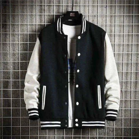 Man in black and white baseball jacket - Premium Baseball Jacket from The Divine Shop - Just Rs.2999! Shop now at The Divine Shop